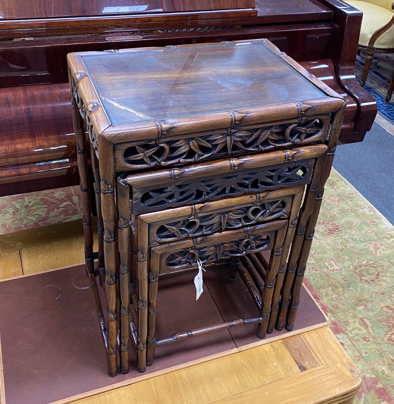 A quartetto nest of four Chinese rectangular hongmu tea tables, width 51cm, depth 36cm, height 72cm
